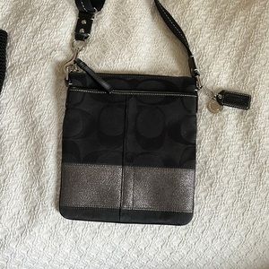 Coach Cross Body Purse : black in color : size 8 1/2” x 7 1/2”